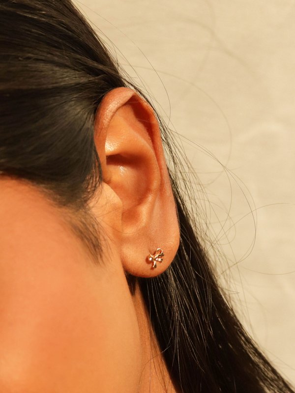 Bow Ear Studs in Champagne Gold 