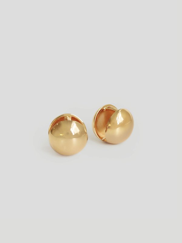 Revolve Ear Huggers in Champagne Gold