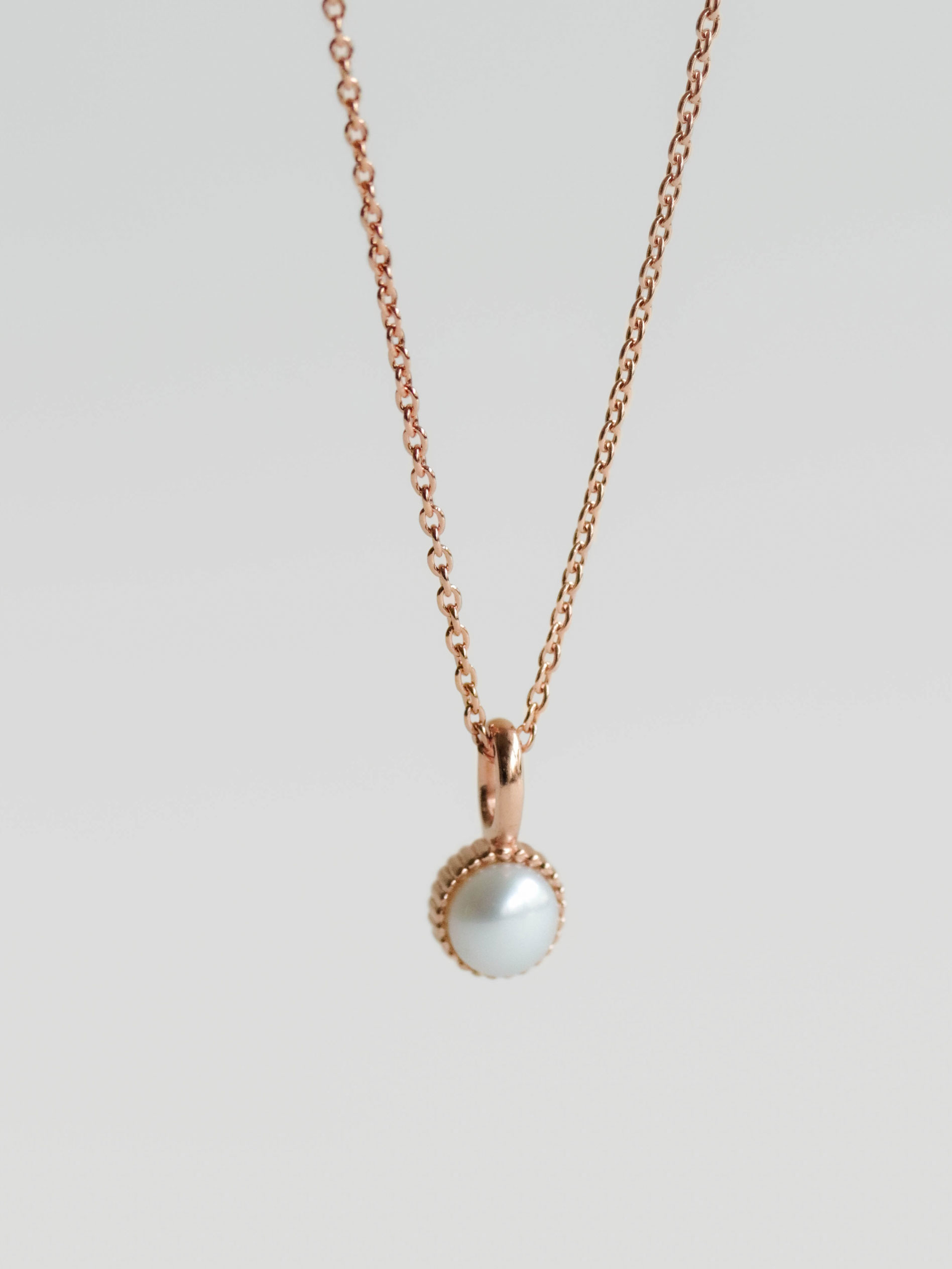 Gold and pearl on sale pendant